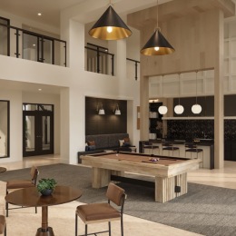 a room with a table and chairs